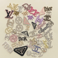50pc Designer Charms - Ivory Background