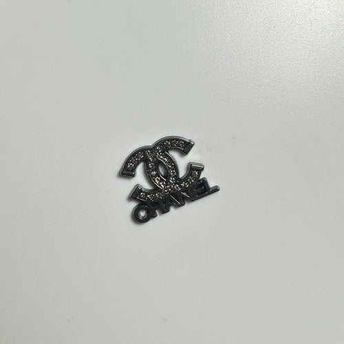 Black cc with letter and Chanel word
