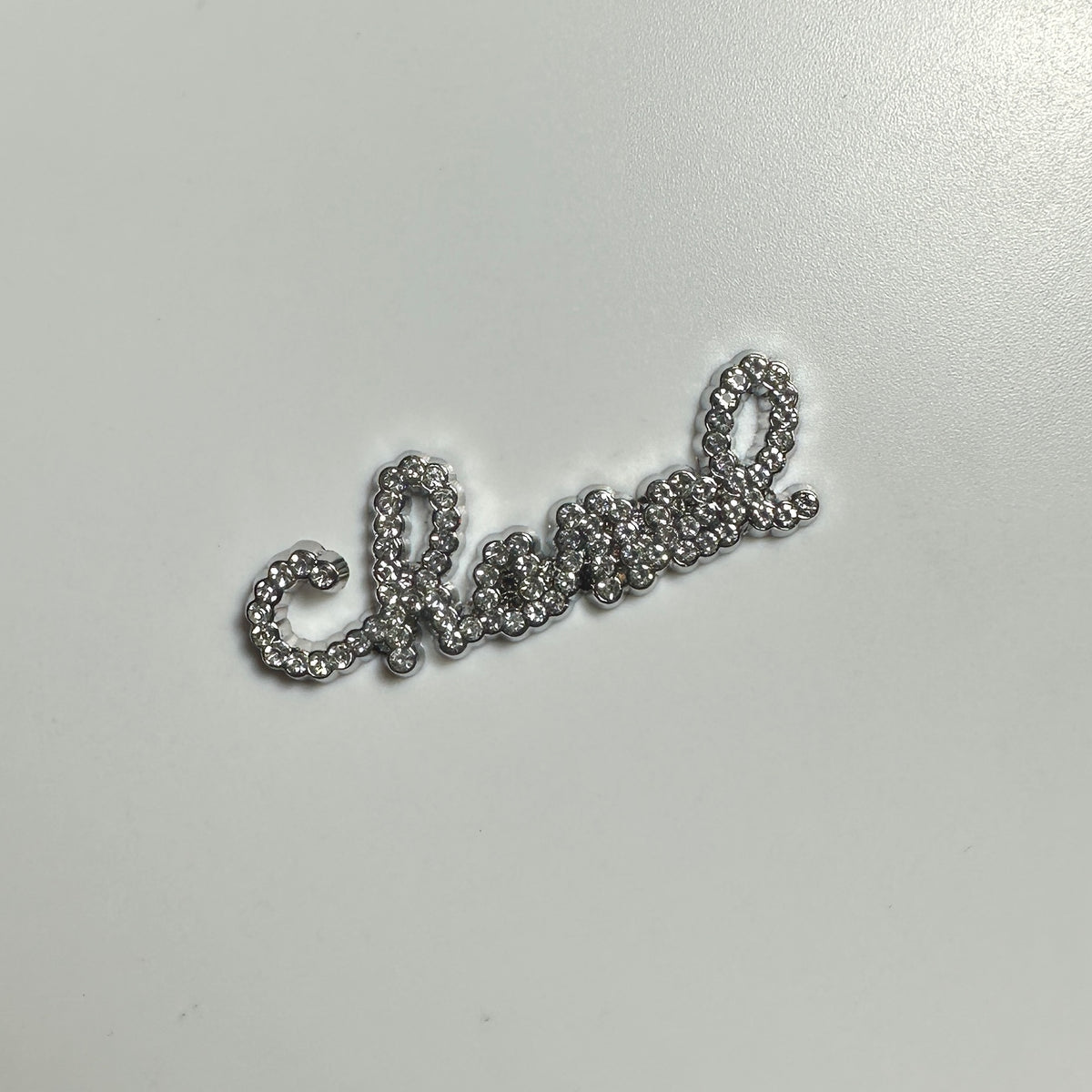 Chanel Silver Curvy Word