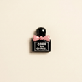 Black Resin Perfume Charm - Ivory Background