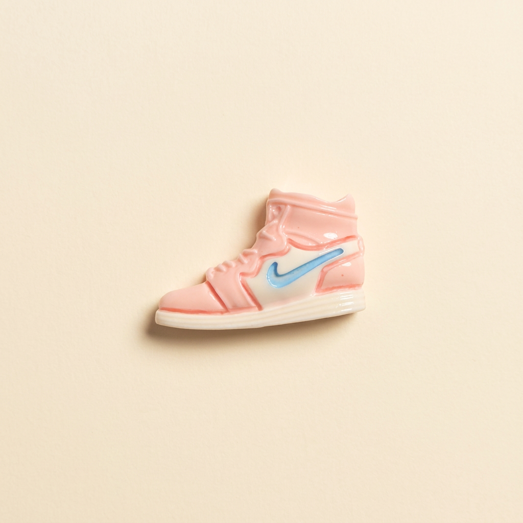 Pink Nike Shoe - Warm Ivory Background